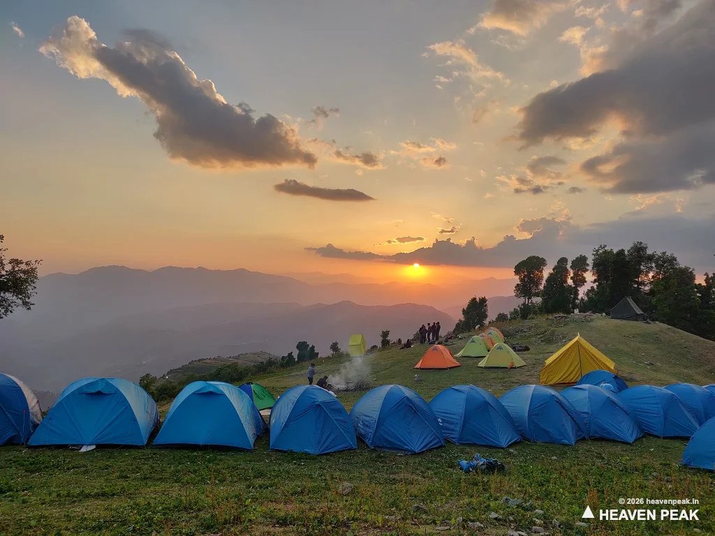 Tents at the Nag Tibba campsite at sunset